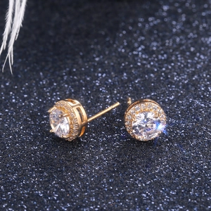 Macro shot of rose gold halo stud earrings with round cubic zirconia and side detail