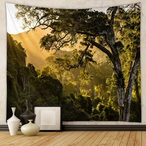 Detail of bohemian landscape tapestry showing sunlight rays through forest trees on wall