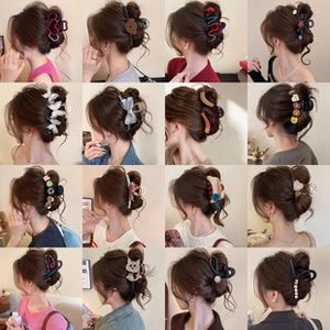 Collage of diverse Korean style pearl and acrylic hair clips worn by a model in detail