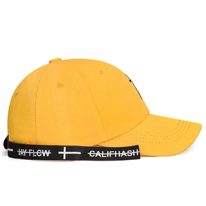 Streetwear ginger yellow cotton baseball cap with printed long ribbons and lettering