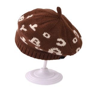 Brown knit jacquard letter beret for children featuring warm autumn wool texture