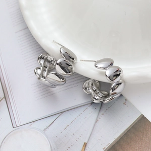 Modern geometric 18K gold plated copper hoop earrings with irregular spherical link design