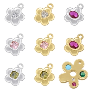 Detailed selection of colorful floral and heart-shaped gemstone pendants in gold and silver