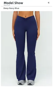 Front view of navy blue high-waisted flared yoga pants with V-shaped waistband detail