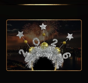 Detail of 2026 New Year headband with gold disco balls and silver tinsel stars