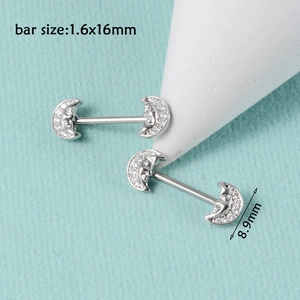 Detailed view of silver moon nipple rings with clear zircons and 1.6x16mm bar size