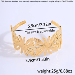 Detail showing dimensions of gold leaf hollow cuff bracelet with 3.4cm width and 5.9cm diameter