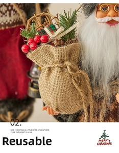Close-up of burlap gift bag detail with red berries and pine on Santa Claus doll