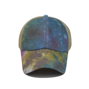 Macro detail of tie-dye galaxy print baseball cap with breathable mesh back and stitching