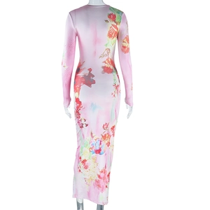 Rear view of a pink long sleeve dress with red and yellow floral print on a mannequin