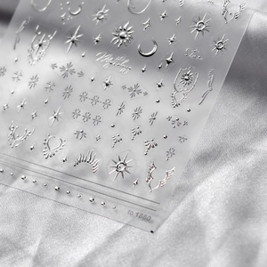 5D embossed silver nail stickers with sun moon stars and celestial motifs