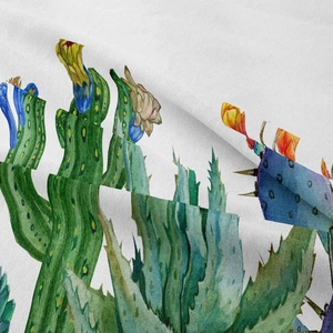 Detailed macro view of the soft twill fabric with vibrant cactus watercolor prints