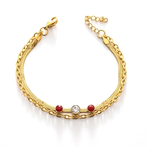 Double-layered gold chain bracelet with red and white crystal heart charms and lobster clasp