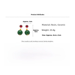 Detail view of vintage resin drop earrings with marble texture beads and silver needle studs