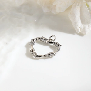 Silver hollow heart star pendant in twisted metal wire design for DIY jewelry