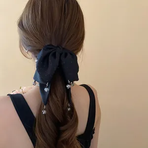 Elegant black bow hair claw clip with sparkling rhinestones and crystal beads for women