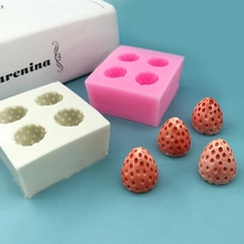Detail of 4-cavity silicone strawberry mold for DIY candles and chocolate decorating