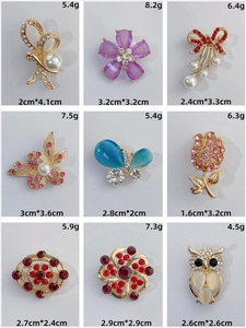 Grid display of nine alloy brooches featuring rhinestones, pearls and floral designs