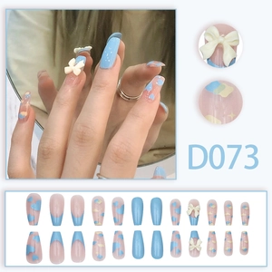 Blue bow heart press-on nails set with long trapezoid clouds and mirror effect