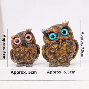 Detailed view of resin owl figurines with natural crystal stones in 5x6cm and 6.5x7.5cm sizes