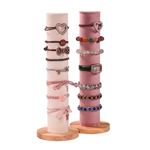 Porte-accessoires de cheveux avec cylindres en velours et socles en bois massif