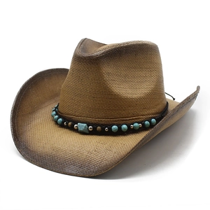 Brown hand-woven cowboy hat with turquoise beads and vintage gradient brim on white background