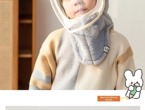Detail of grey plush winter hood with integrated face shield for child wind protection