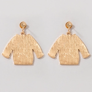 Close-up of creative golden sweater shaped stud earrings with detailed metal texture