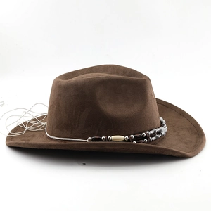 Detailed view of a brown suede cowboy hat with ethnic beaded band on a white background
