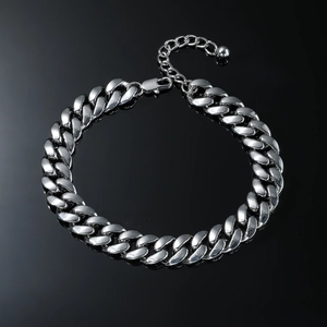Detailed view of silver Cuban link anklet with lobster clasp and adjustable extension chain
