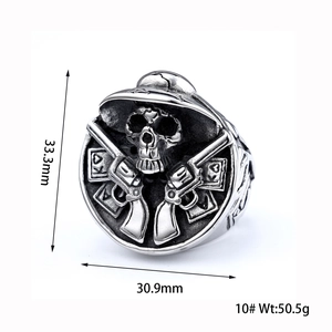 Vintage stainless steel skull and dual revolver ring with detailed masonic symbols