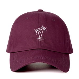Vintage burgundy baseball cap with white embroidered palm tree and adjustable strap
