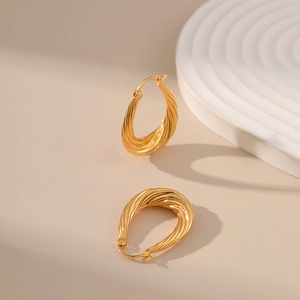 Classic 18K gold plated brass geometric twisted hoop earrings in minimalist waterdrop style