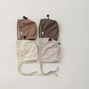 Cute newborn bee-style earflap hats in four neutral Morandi colors with ties