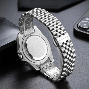 Macro view of stainless steel men's watch back and five-link bracelet structure