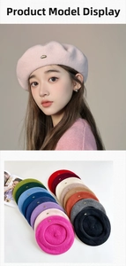 Detail of wool beret showing a metal logo and diverse color palette display