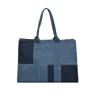 Blue denim patchwork tote bag with large capacity and sturdy handles for women