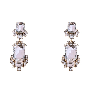 Vintage geometric square crystal earrings with gold metal frame on a white background