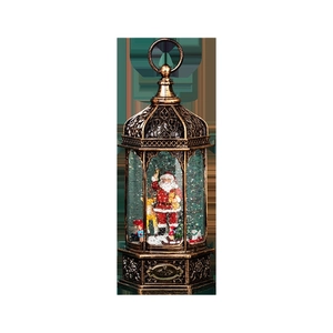 Vintage bronze Christmas lantern music box with Santa, reindeer and swirling snow glitter