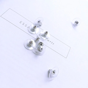 Clear silicone earbud backings with silver metal core detail for stud earrings