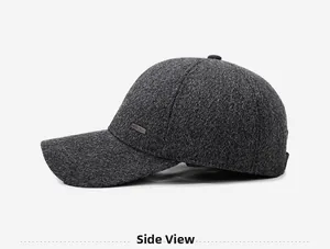 Side view of dark gray textured baseball cap with metallic logo and thick fabric detail