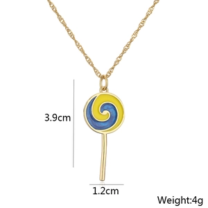 Detail showing 3.9cm lollipop pendant with blue and yellow enamel in 18K gold plated finish
