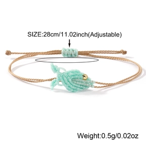 Handmade woven fish bracelet with adjustable mint green string and golden bead