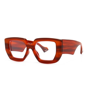 Modern vintage oversized square amber sunglasses with thick patterned acetate frame
