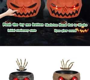 Animated Halloween pumpkin candy bowl with glowing eyes and shaking skeleton hand feature
