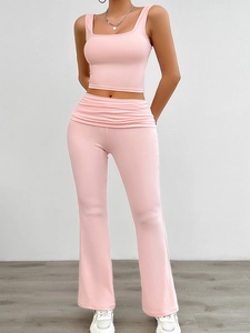 Detailed view of pink square neck tank top and high waisted flare pants set for women
