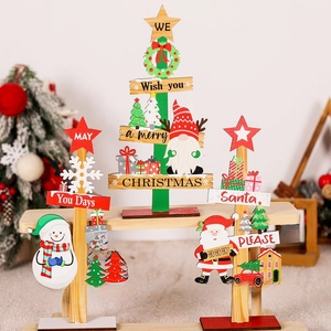 Detailed view of wooden Christmas desk signs featuring Santa, snowman, and gnome designs