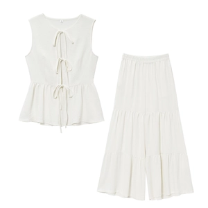 Elegant cream two-piece set featuring tie-front sleeveless top and tiered wide-leg pants