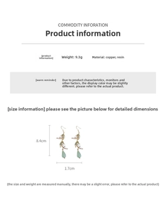 Detail of lily of the valley resin earrings showing 9.3g weight and 8.4cm length dimensions