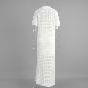 Detail of white hollow-out knit two-piece set featuring geometric crochet patterns on the back